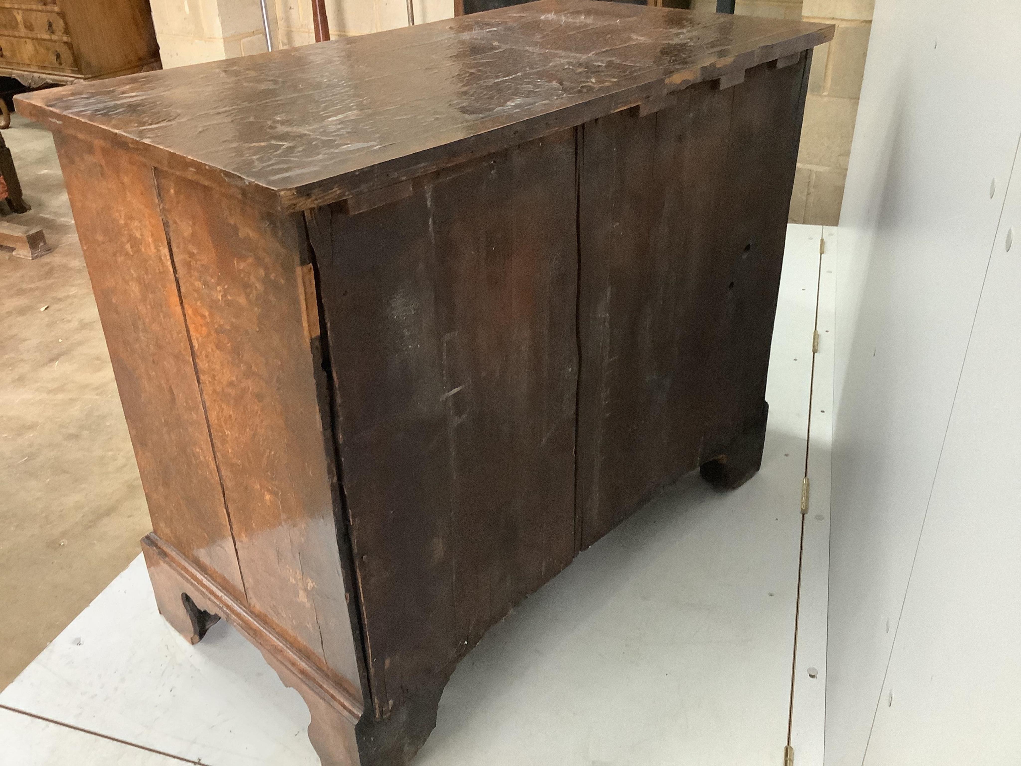 A George III burr elm chest of drawers, width 105cm, depth 57cm, height 86cm. Condition - fair